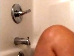 Babygirl gets horny in the tub masturbates with water