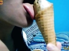 Beautiful teen sucking ice cream like it's a big dick
