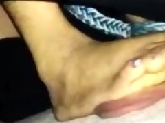 Sexy Asian dominates slave balls with her strong feet