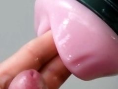 Extreme close up of cock in slow motion with Fleshlight and finished by cumshot