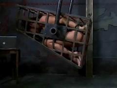 Caged woman is in the world of pain BDSM porn