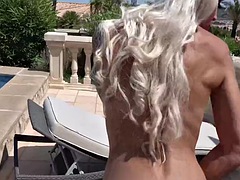 Horny blonde girlfriend does me outdoor by the pool
