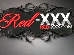 Redhead MILF Red XXX fucks herself with a huge dildo